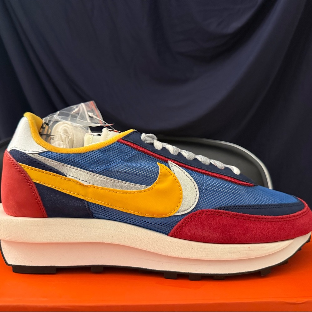 Nike Men's Blue and Red Sneakers with Yellow Accents